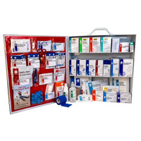 Open first aid kit with various medical supplies on a white background