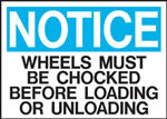 Notice Wheels Must Be Chocked Before Loading Or Unloading Sign